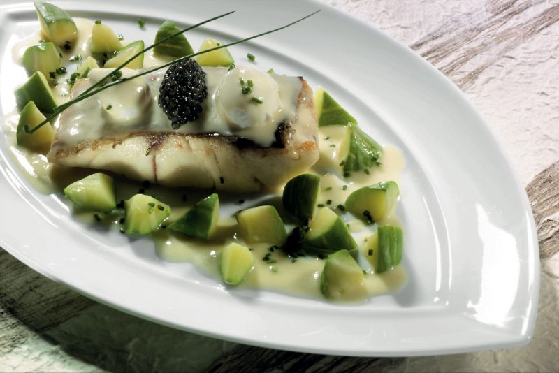 Branzino con trombette e caviale