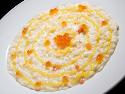 Risotto con agrumi, granchio reale dell’Alaska e ikura