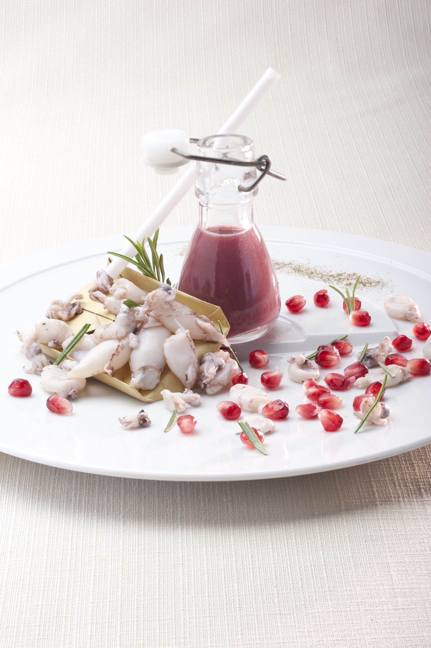 Succo Di Melograno Calamaretti Spillo E Sale Al Rosmarino Italian Gourmet