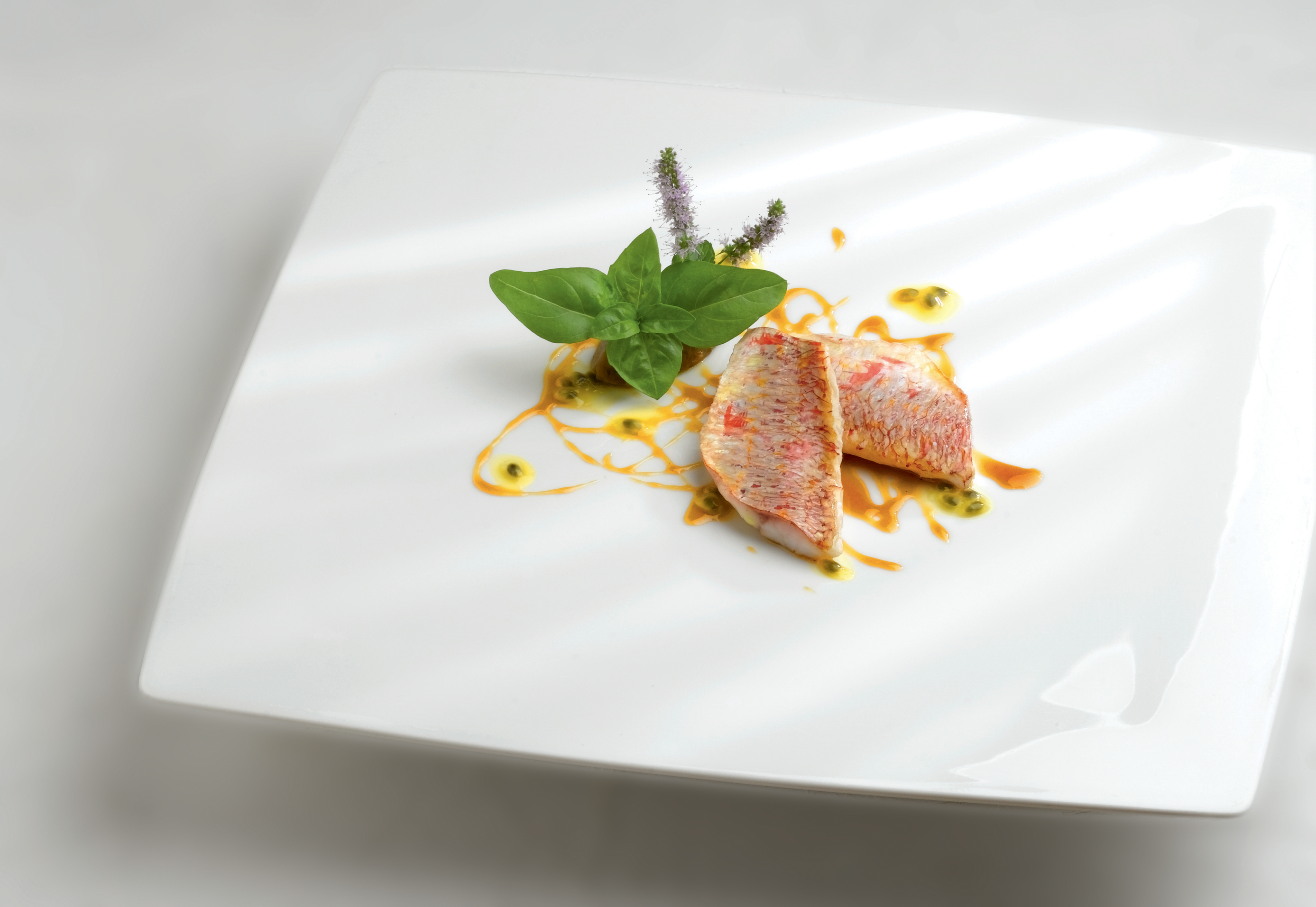Triglia Di Scoglio E Caviale Di Melanzane Con Salsa Al Frutto Della Passione Italian Gourmet