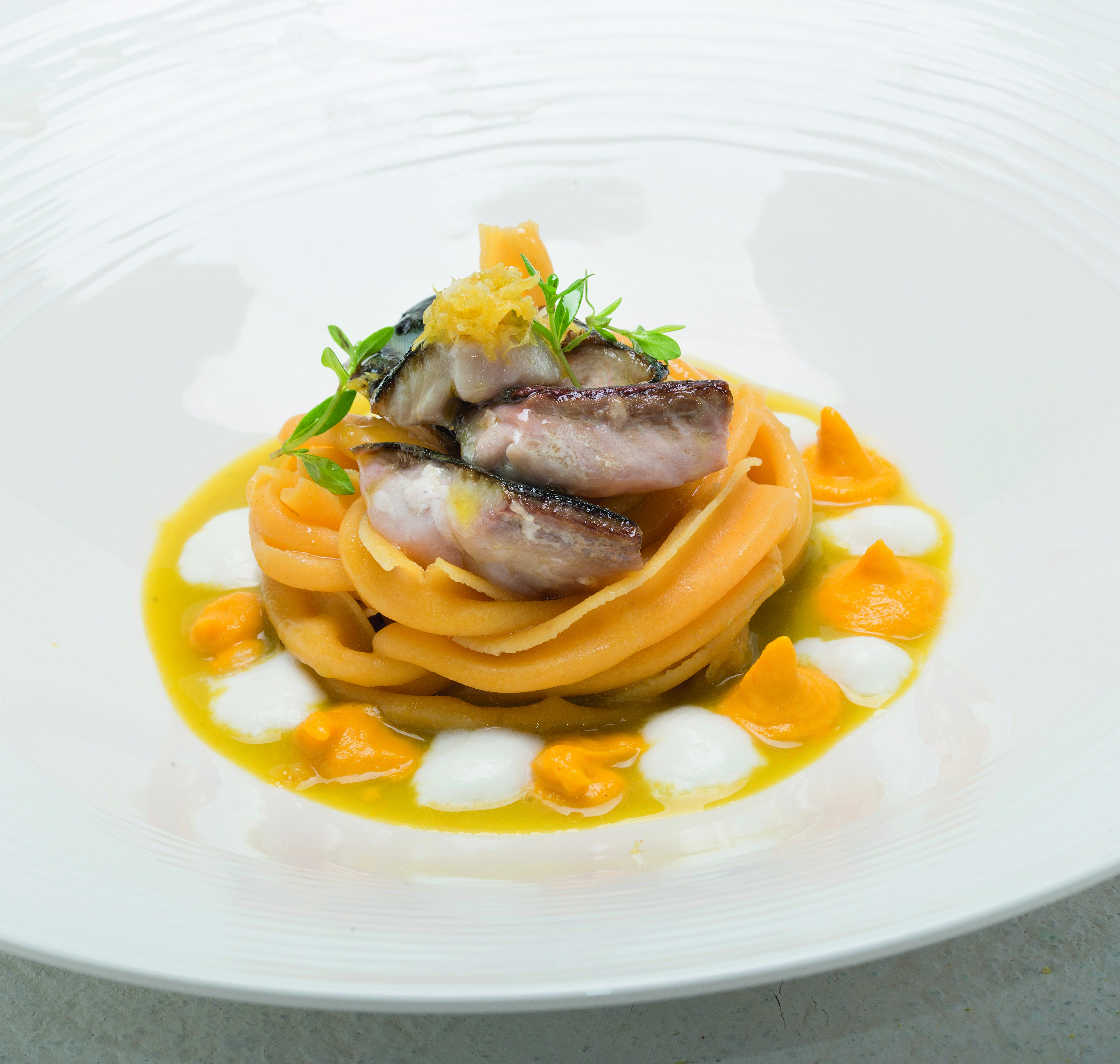 Ricciarello Di Ceci E Timo Con Brodo Di Carote E Sgombro Arrostito Italian Gourmet